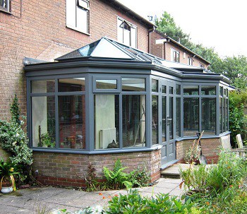 Grey timber orangery exterior